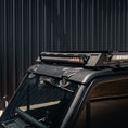 Load image into Gallery viewer, Roof-mounted light bar on a vehicle with a dark background