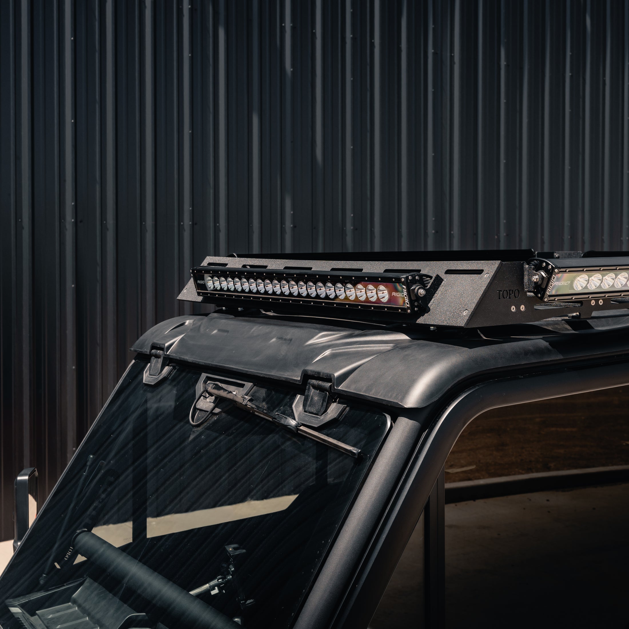 Roof-mounted light bar on a vehicle with a dark background